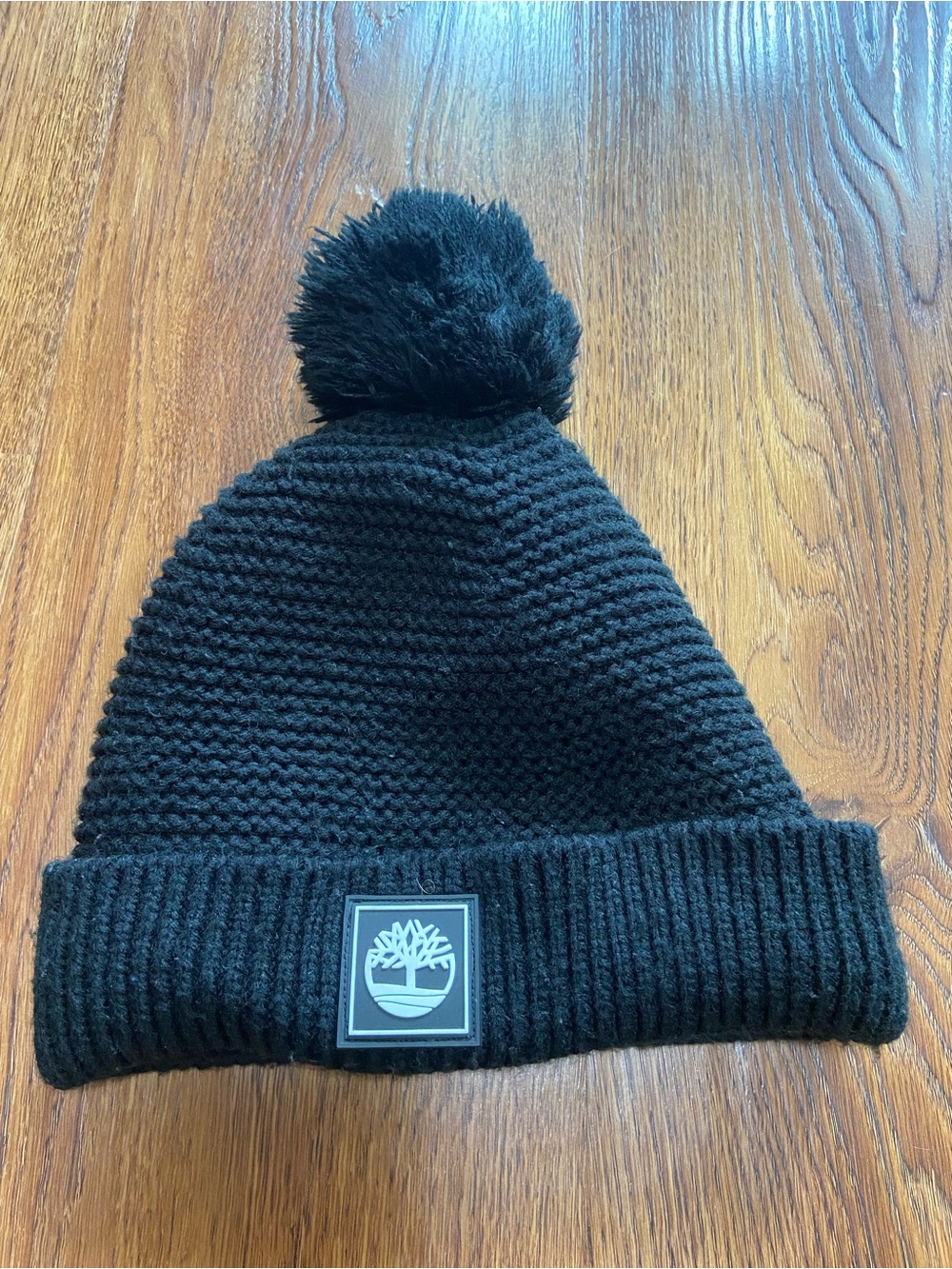 Timberland Black Pom Pom Knit Beanie with Logo Patch fleece lining